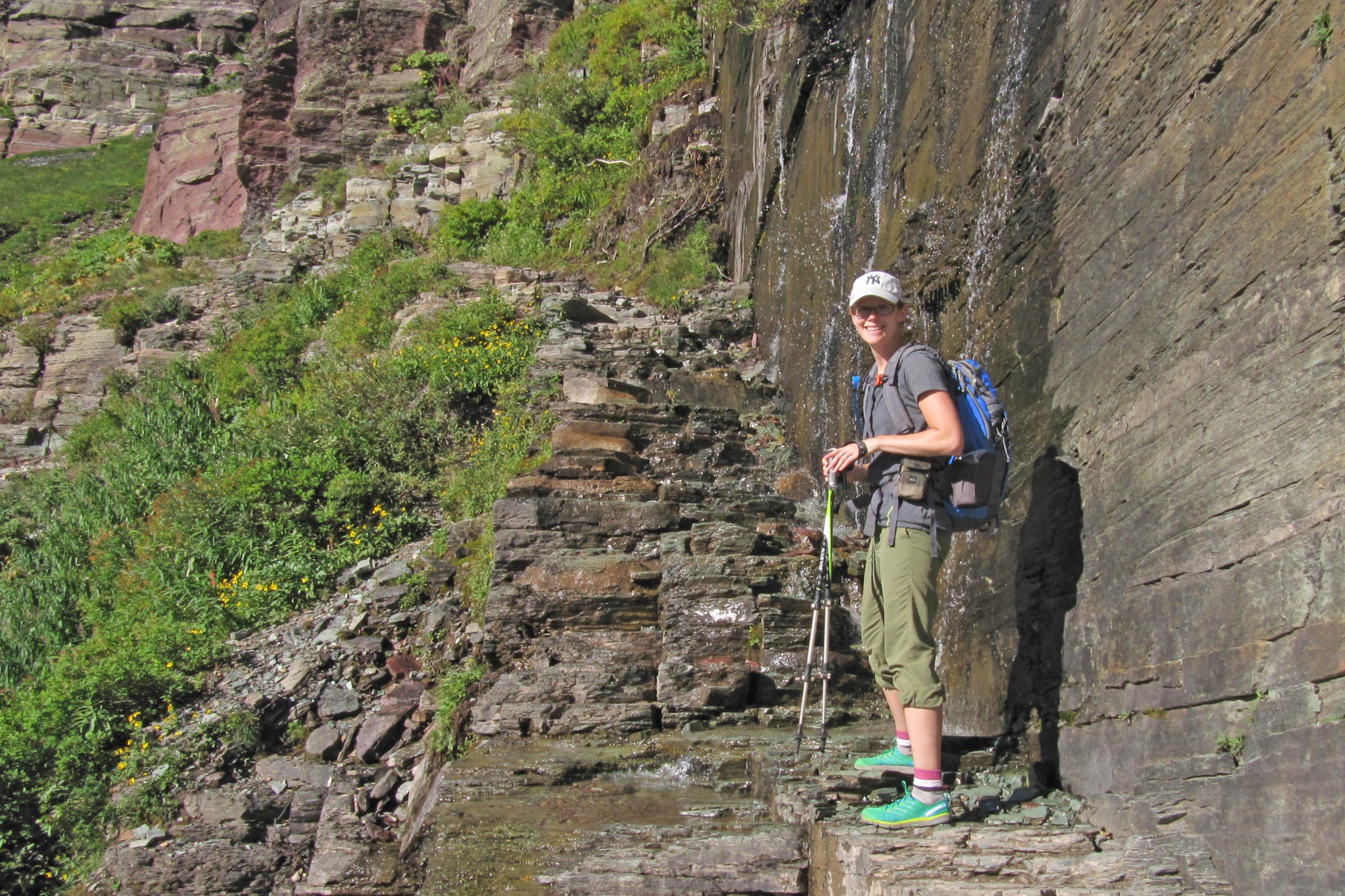  Crossing Grinnell Glacier Trail waterfall