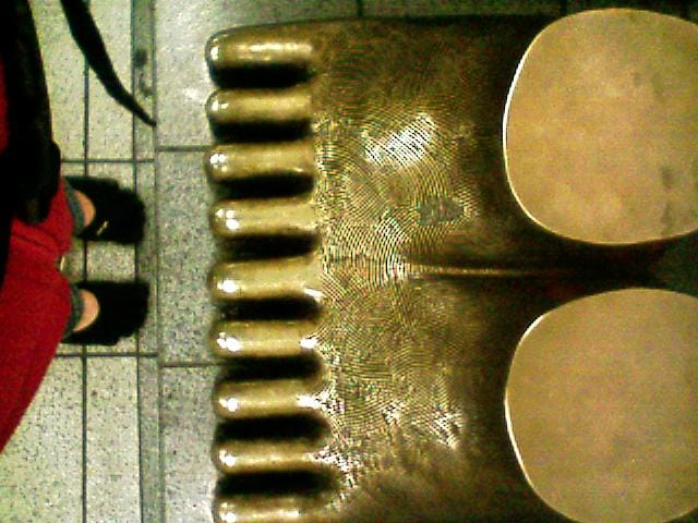 FiveFingers and Tom Otterness sculptures on the Subway in NYC