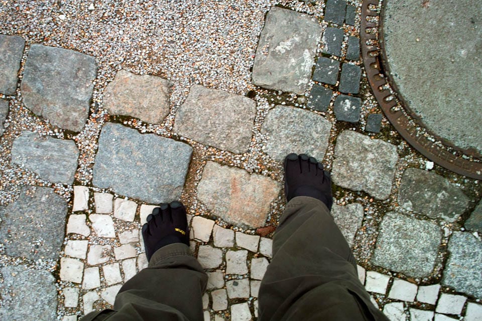 Brian at the Berlin Wall (in KSO Vibram Five Fingers)