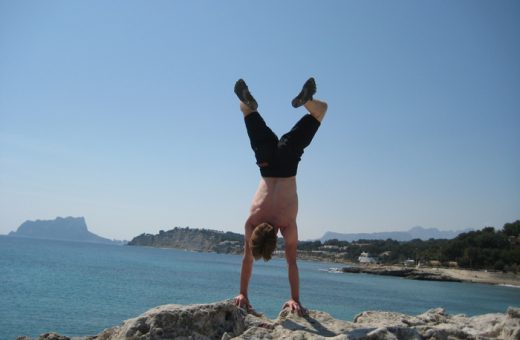 Here we see Ben doing a handstand in Moraira, Spain.  Note his Speed FiveFingers!