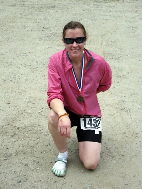 Becky in her Vibram Five Fingers Bikilas after the Slacker Half Marathon
