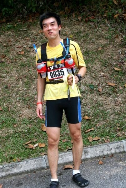 Bernard chows down on a banana prior to his 100km trail race in FiveFingers KSOs.