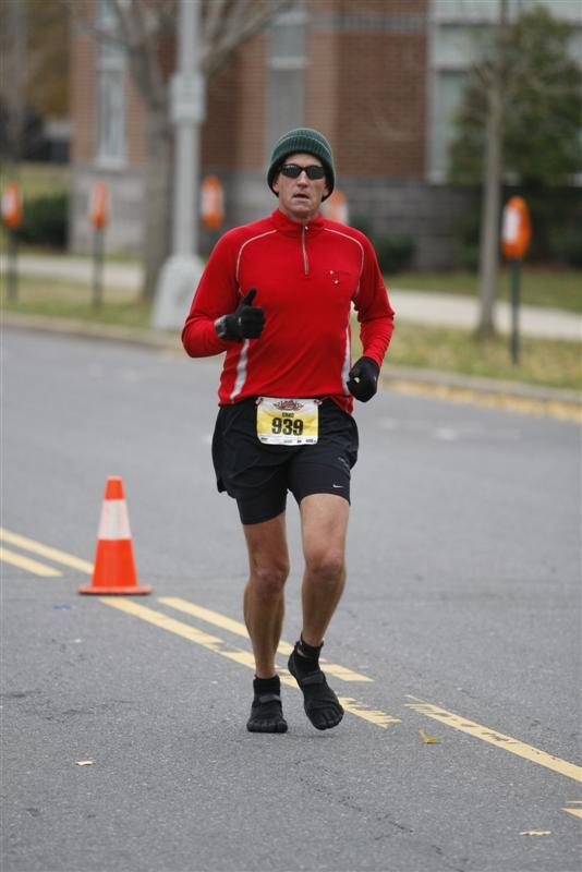 Chad Randloph is seen running in the Thunder Road marathon in Charlotte.  He's wearing his KSO Treks plus a couple pairs of Injinji socks for added warmth.  Chad had his best marathon time in three years and eight marathons in this race!  Congrats, Chad!