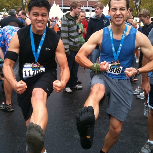 Bien and Chris pose in their Vibram FiveFinger KSOs at the finish line of this past weekend's Baltimore Half-Marathon.
