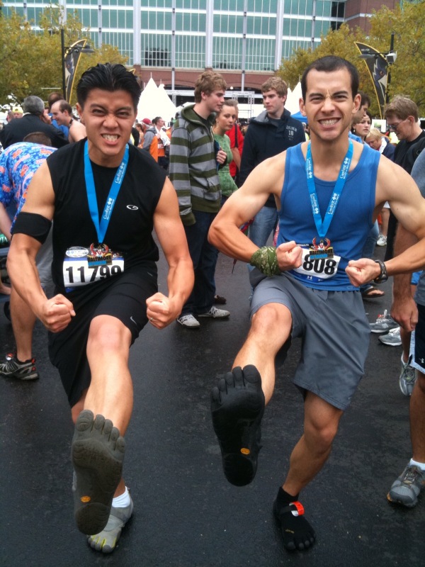 Bien and Chris pose in their Vibram FiveFinger KSOs at the finish line of this past weekend's Baltimore Half-Marathon.