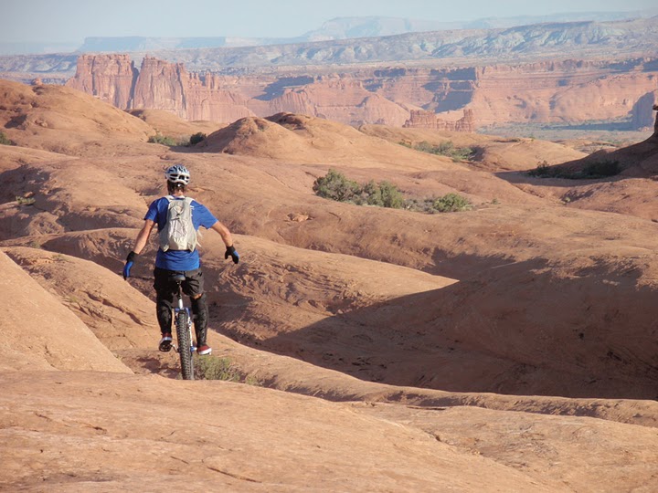 Rob Youngren mountain unicycling the Slick Rock Trail in Moab, Utah