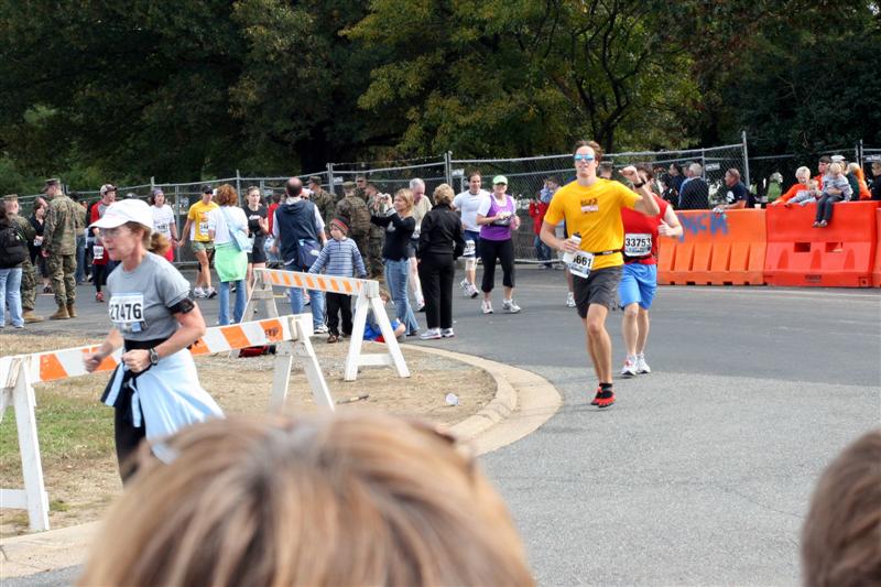 Here's Tim rounding the corner of the Marine Corps Marathon this past Sunday in his VFF Sprints.