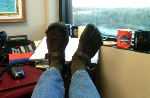 In addition to running in his VFFs, Dave kicks back in his Vibram Five Fingers KSO Treks while at work in Knoxville, Tennessee.