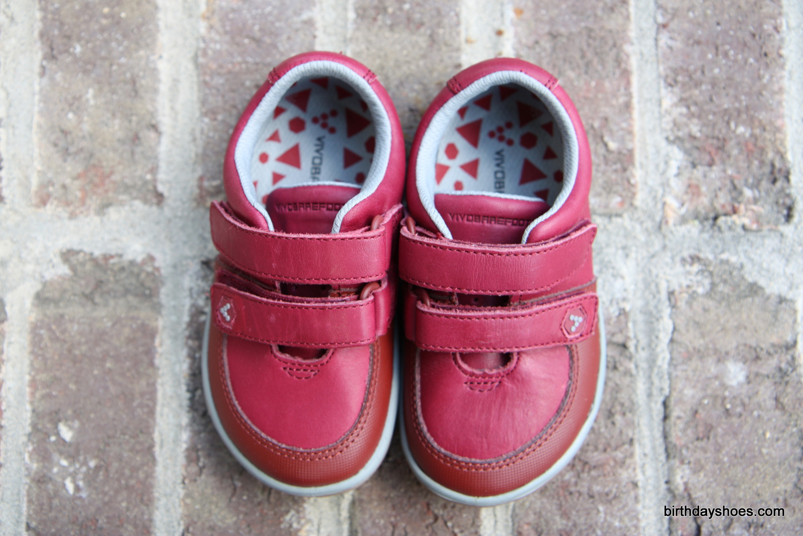 The VivoBarefoot Rooty in a cranberry red.