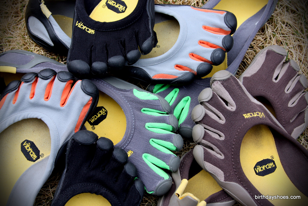 A pile of the open-topped Classic Vibram FiveFingers, the original "barefoot shoe" from Vibram and the most minimal, outdoor-use VFFs available.