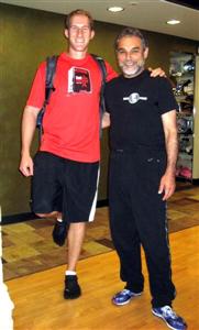 Here Ben poses alongside Dr. Nicholas Romanov at a pose method running clinic he attended - note the Vibram Five Fingers!